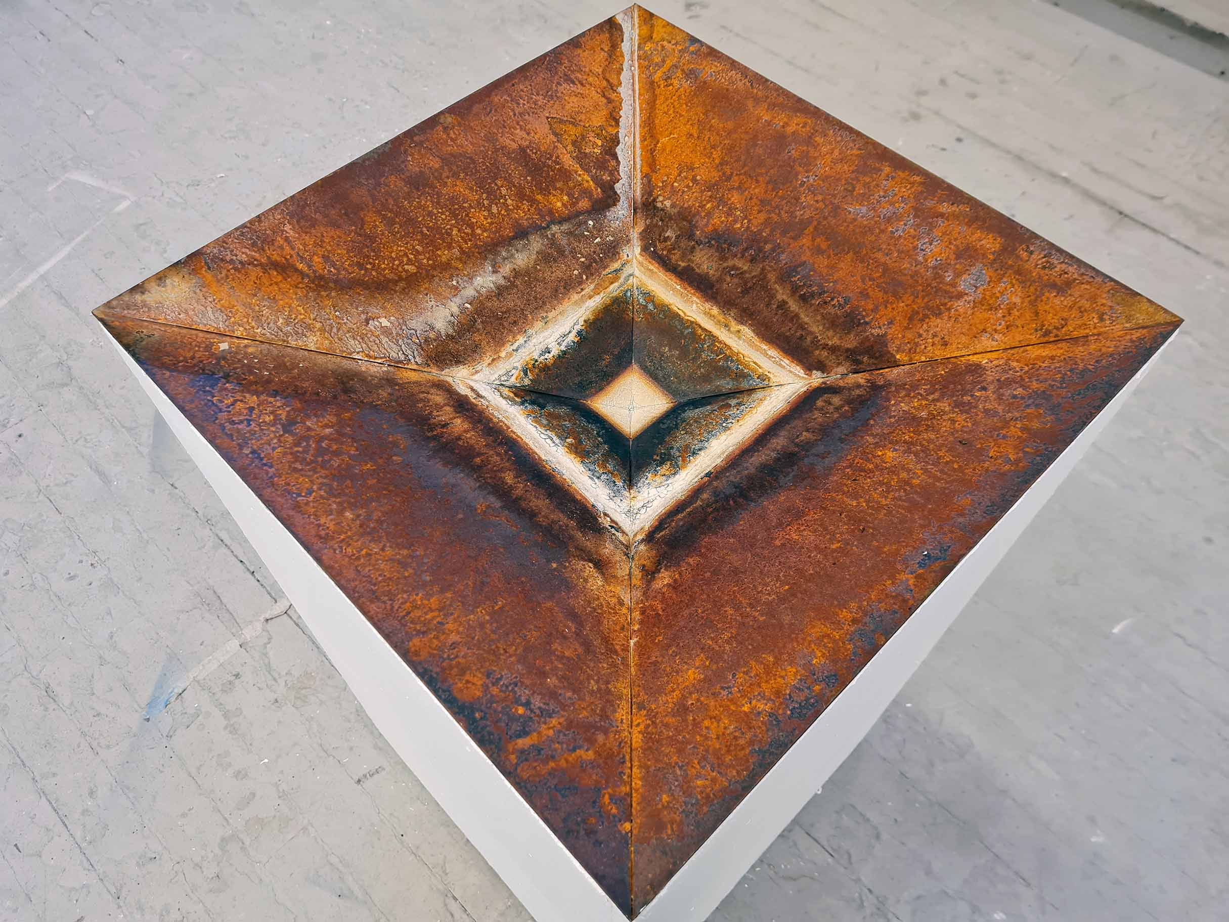 rusted steel square basin