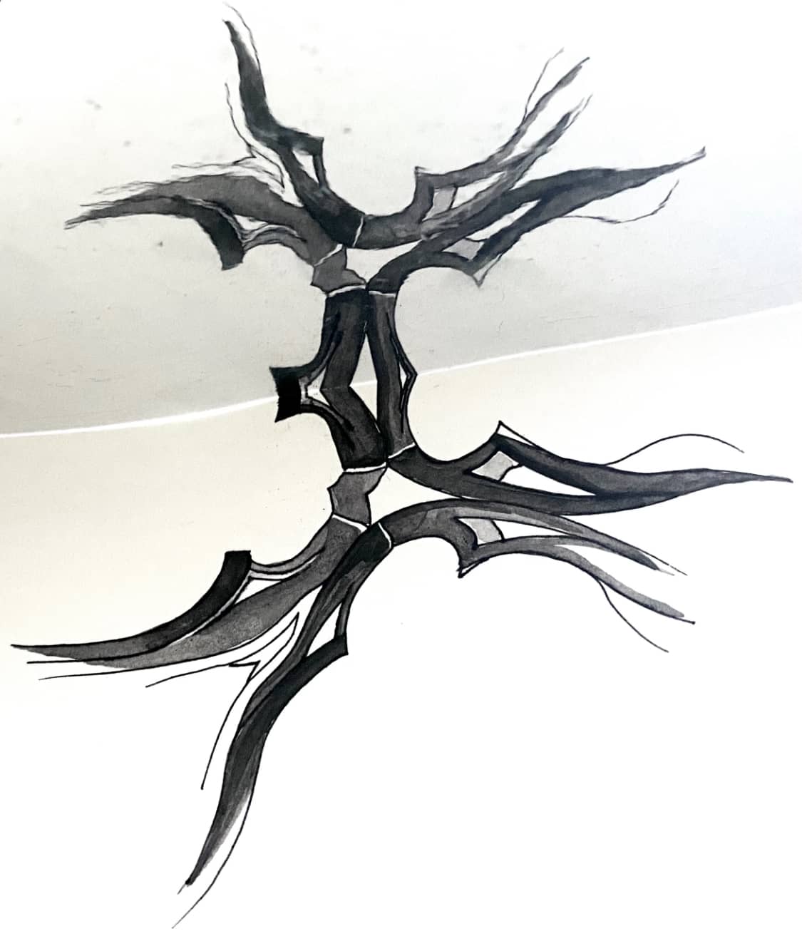 a flexible mirror held up to a black ink drawing of a reflected church window, creating a total image resembling a fragmented and disrupted stained glass