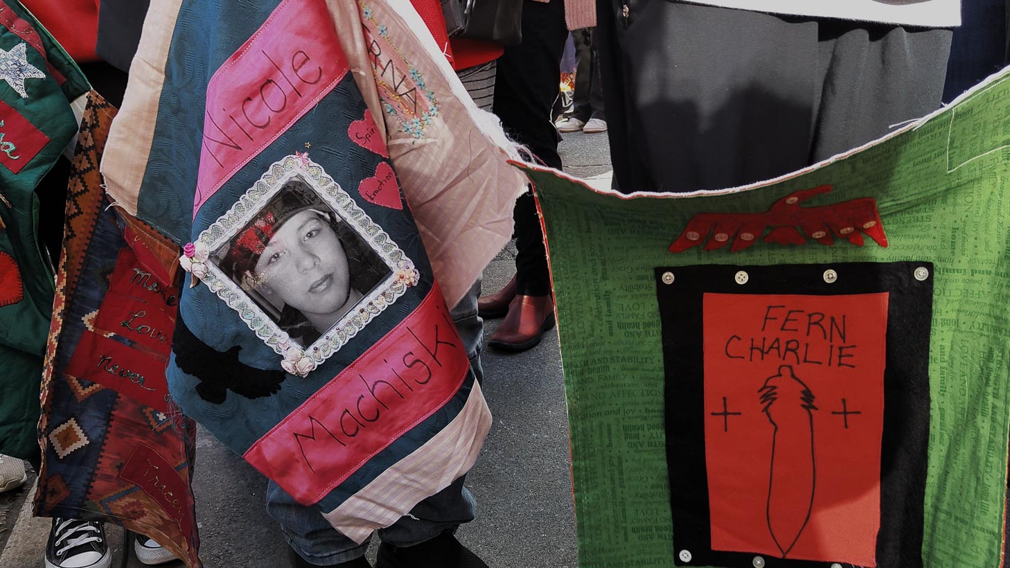 Memorial quilts at march