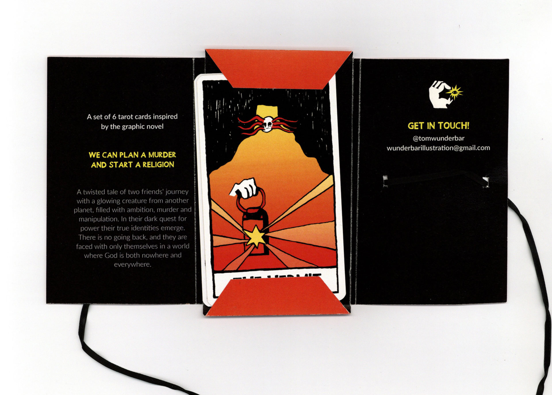 A paper tarot card packaging opened showing the cards