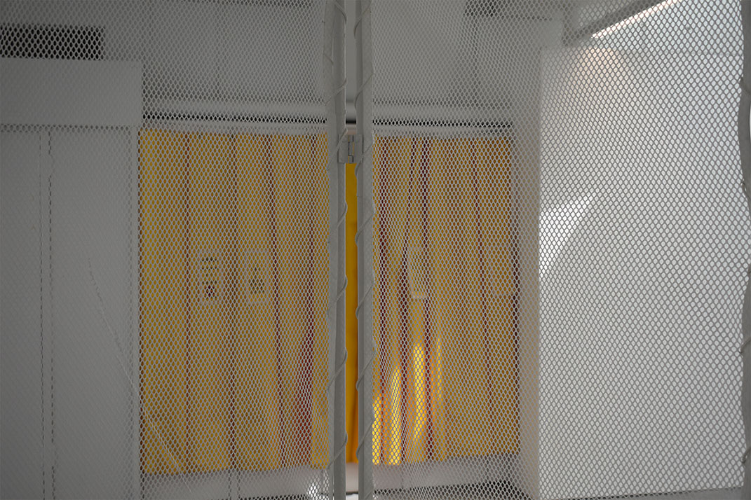 Close-up of curtain and privacy screen 