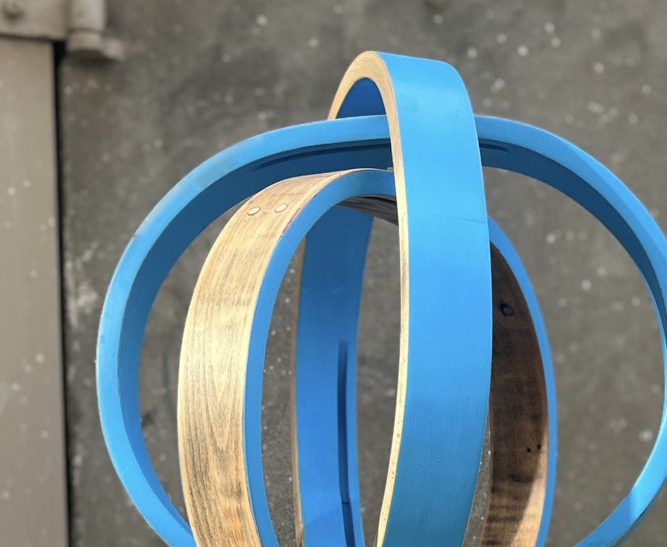 Blue sculpture made from chair aprons.