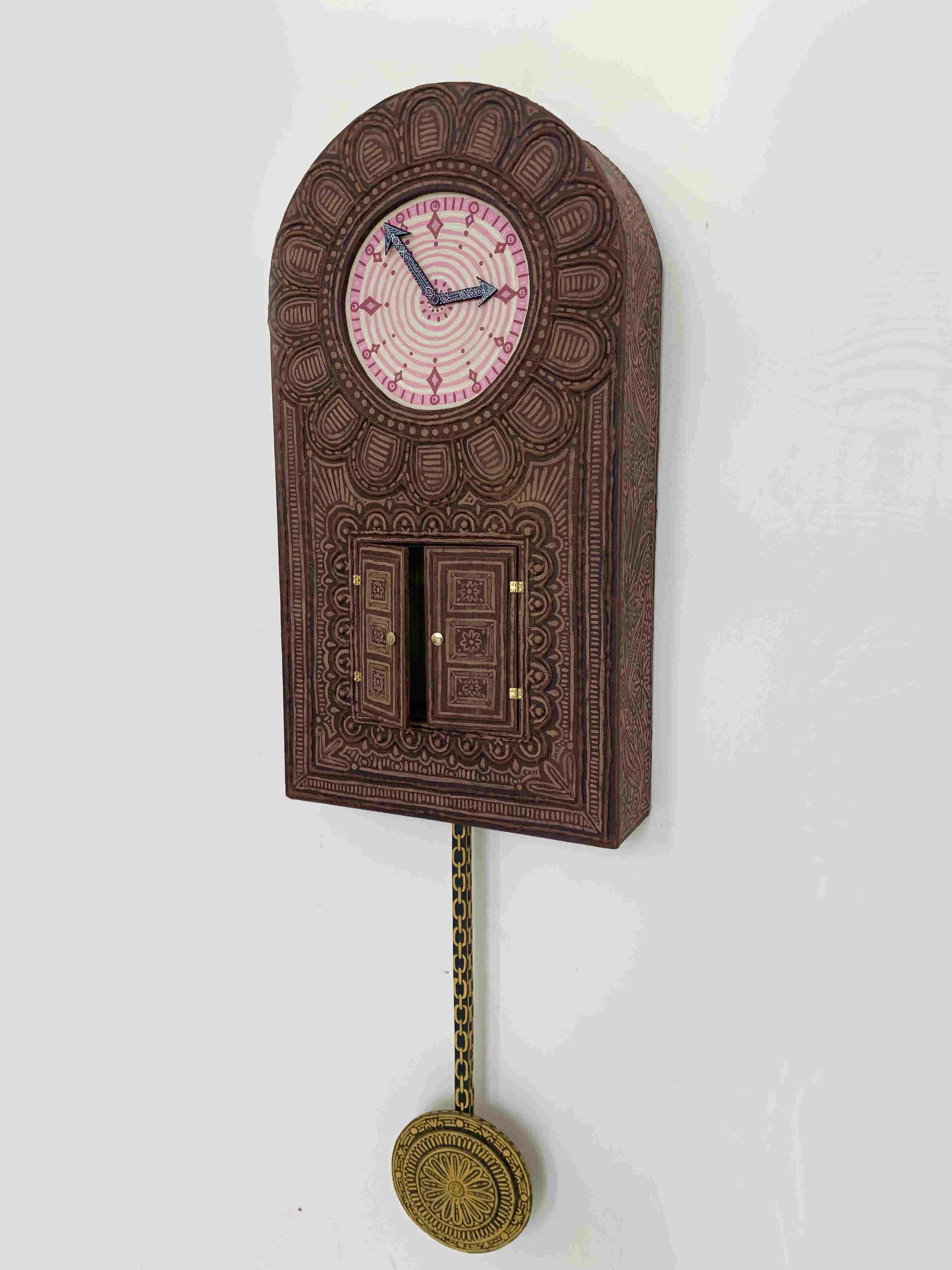 hand painted wall clock with doors on the front and swinging pendulum, front view