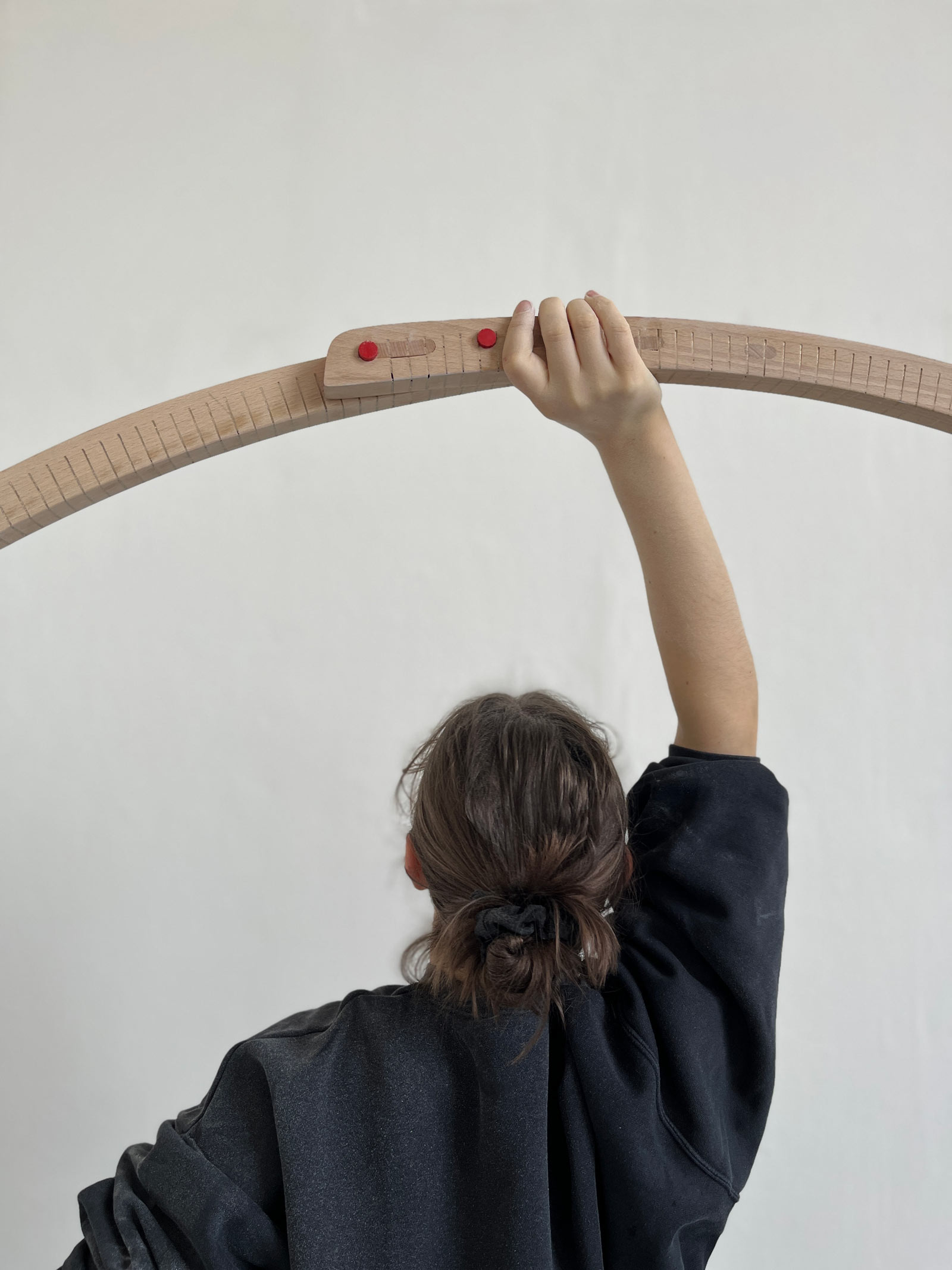 Girl holding a wooden ring