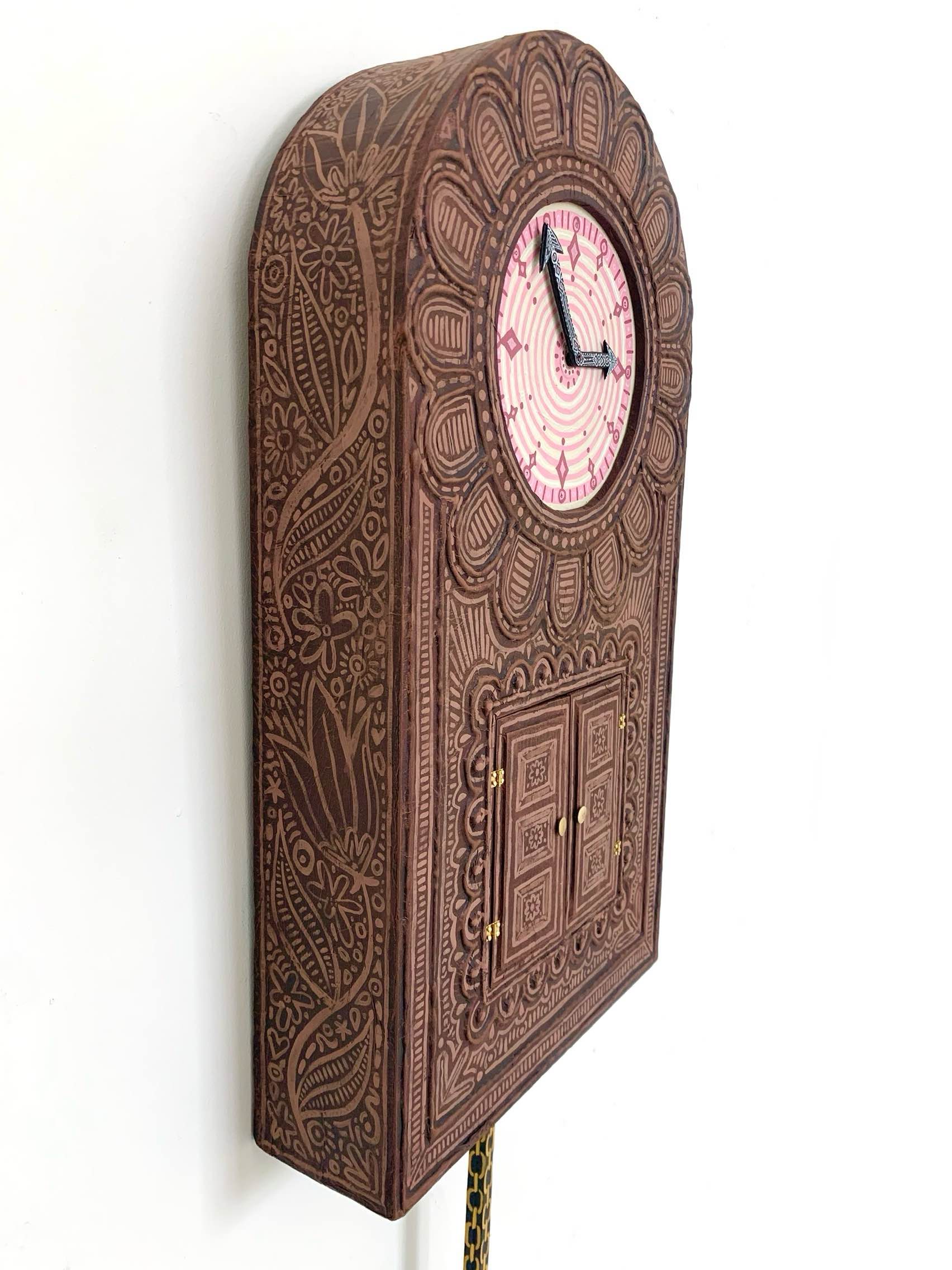 hand painted wall clock with doors on the front, side view
