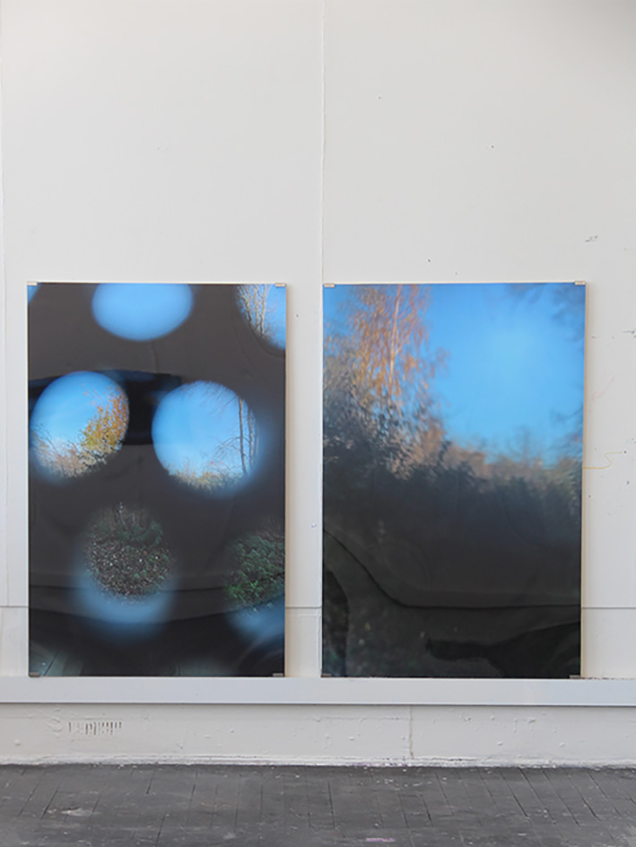 Close up of two photographic works 
