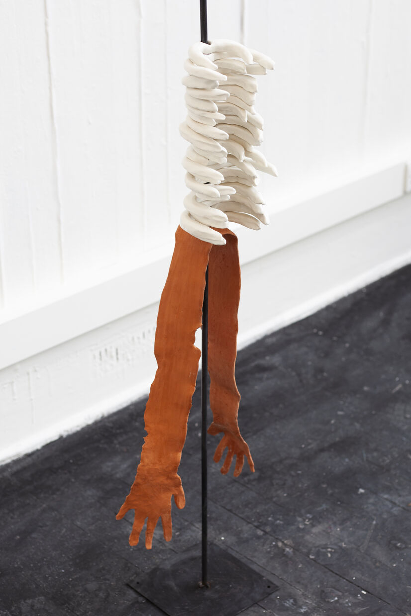 ceramic arms and ribs on a steel pole