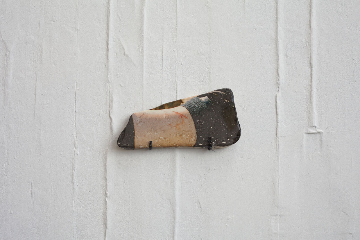 image of cut on leg on ceramic