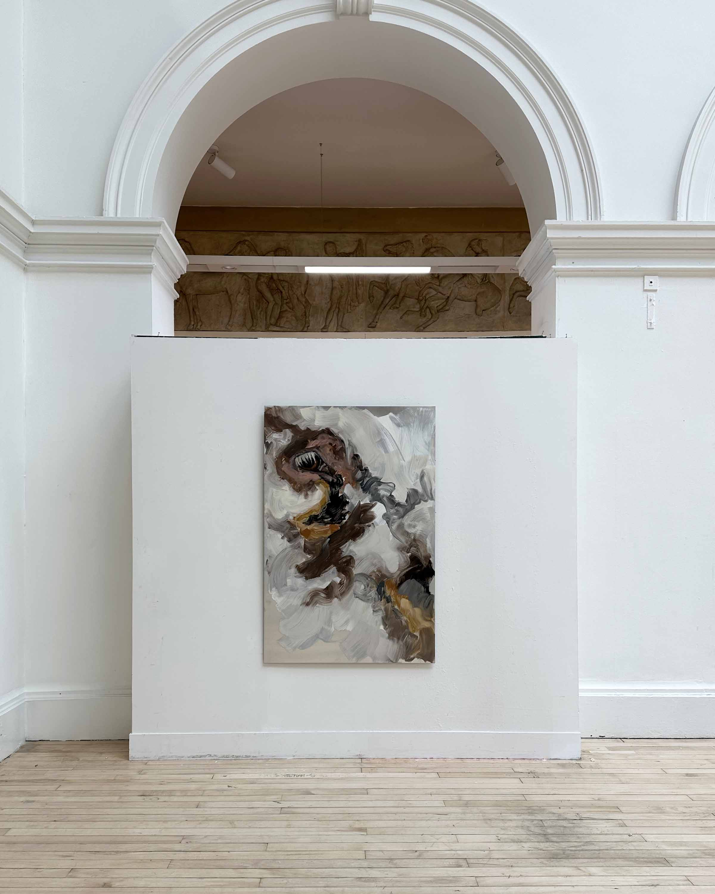 Oil painting of pig eye on aluminium panel on wall underneath arch