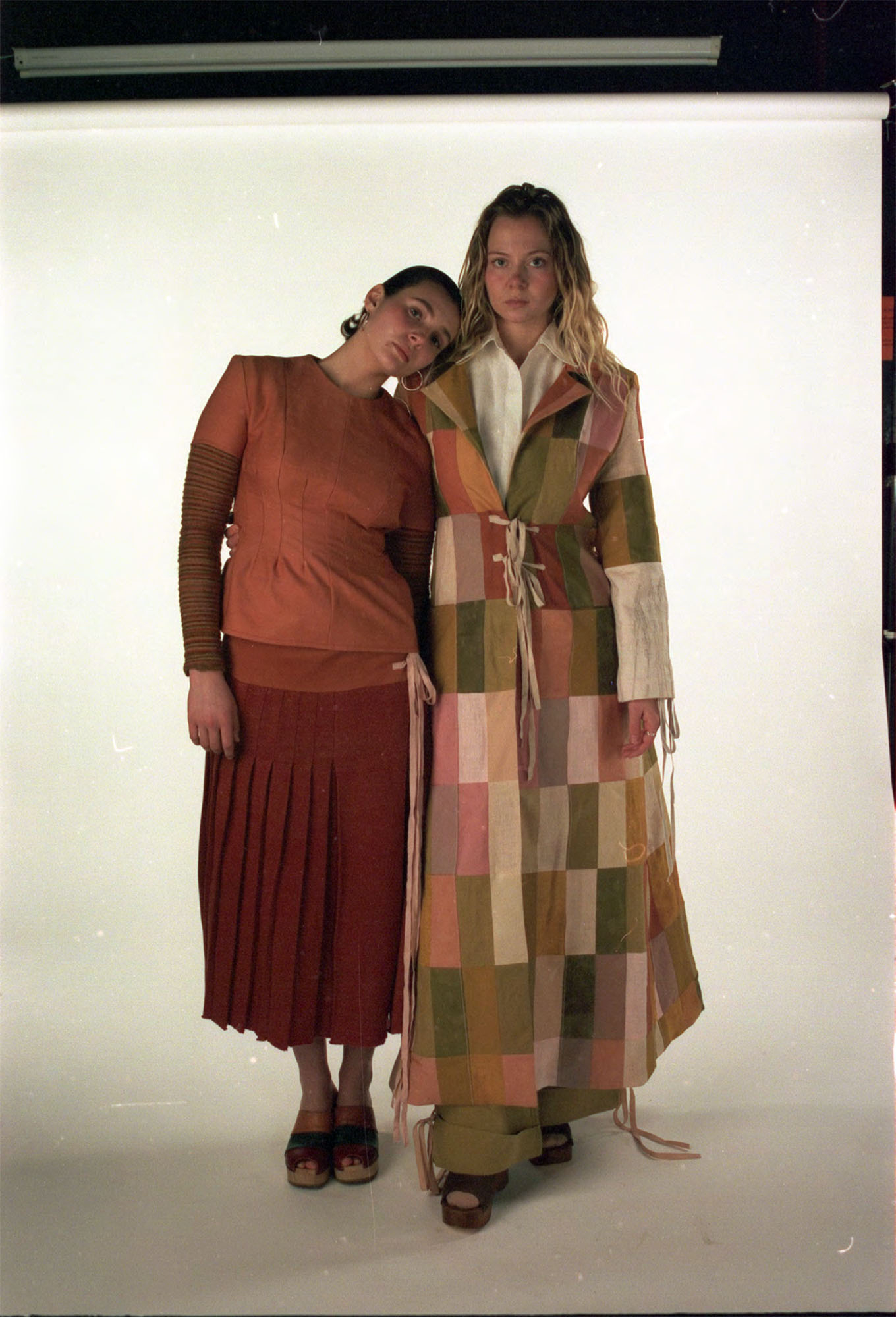 Wool top and knitted kilt dyed with madder, with striped base layer knitted with dyed scrap yarns, Patchwork coat made from dyed fabric scraps of wool, cotton and linen.