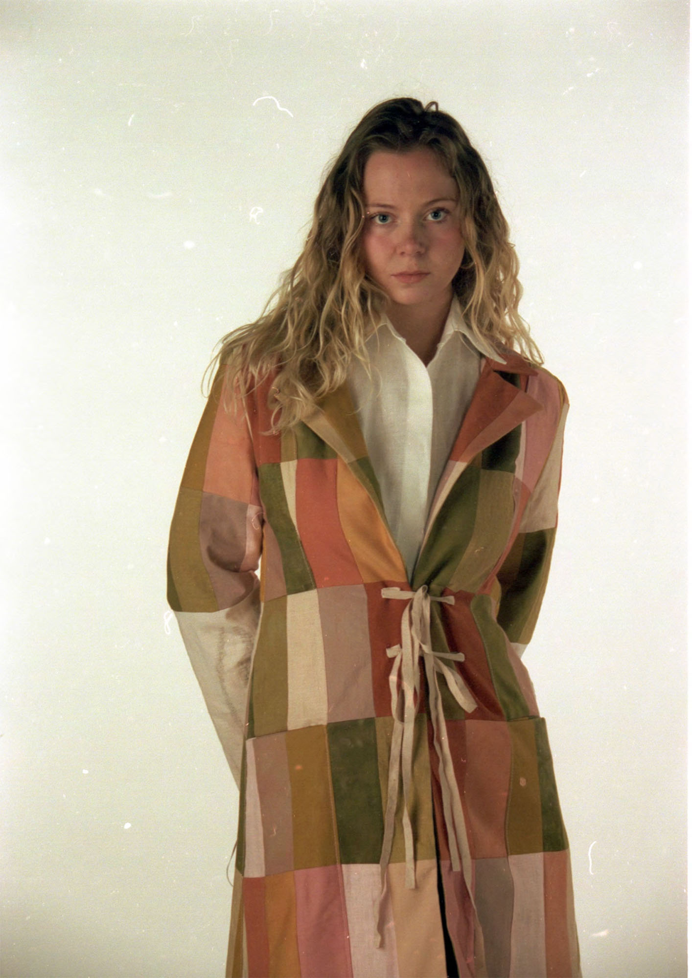 Patchwork coat made from dyed fabric scraps of wool, cotton and linen.