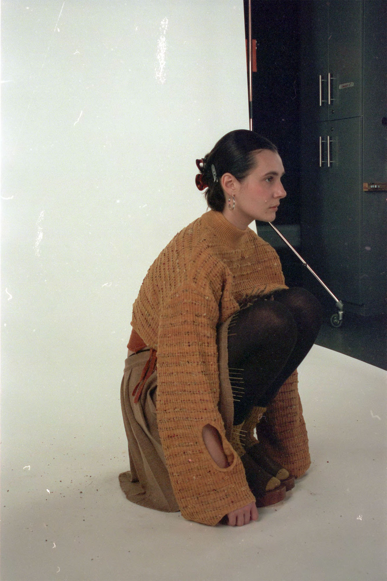 Knitted jumper and vest dyed with yellow onion skins, paired with knitted skirt made from undyed cashmere and silk.