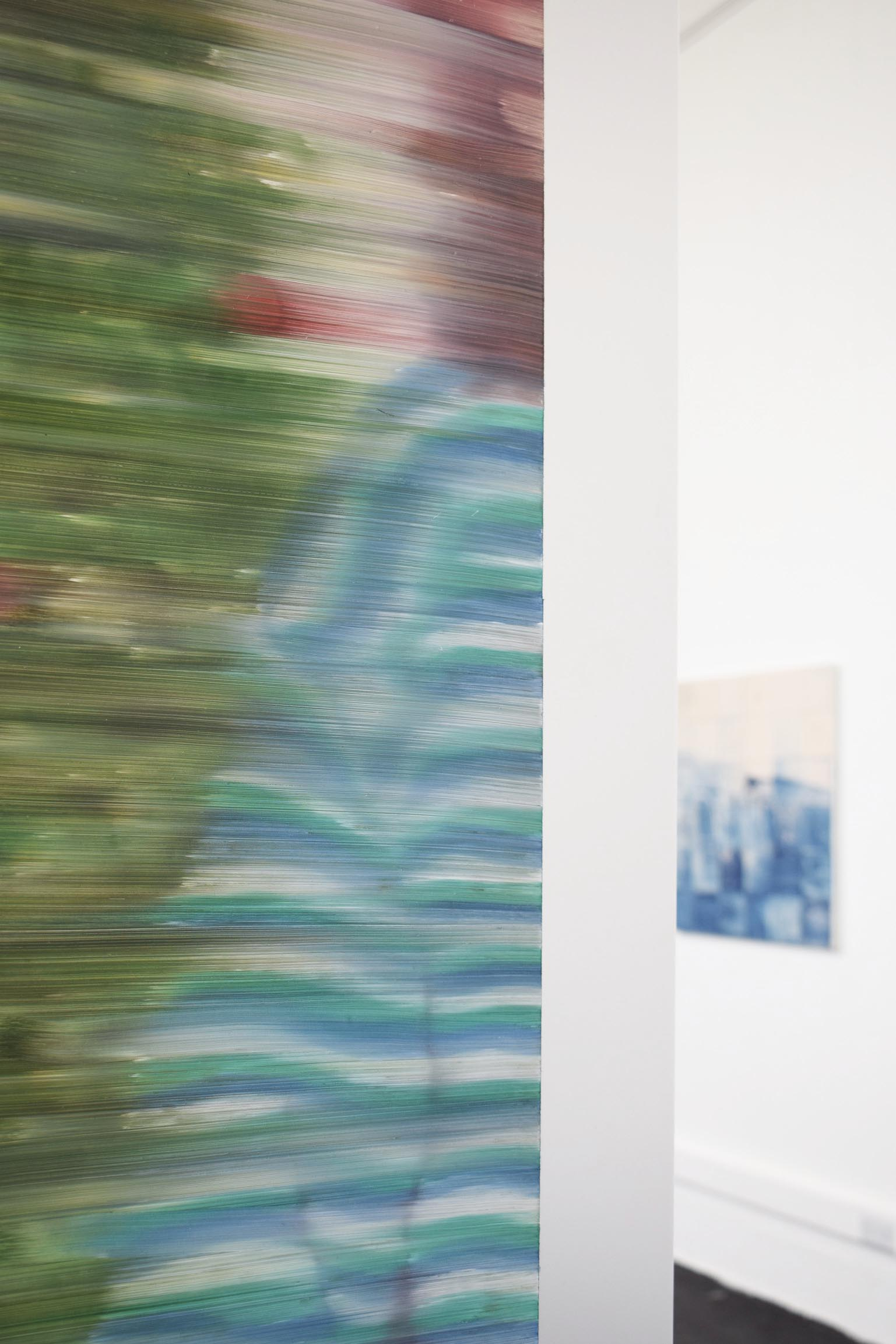 Close up of a painting installed in the centre of the room