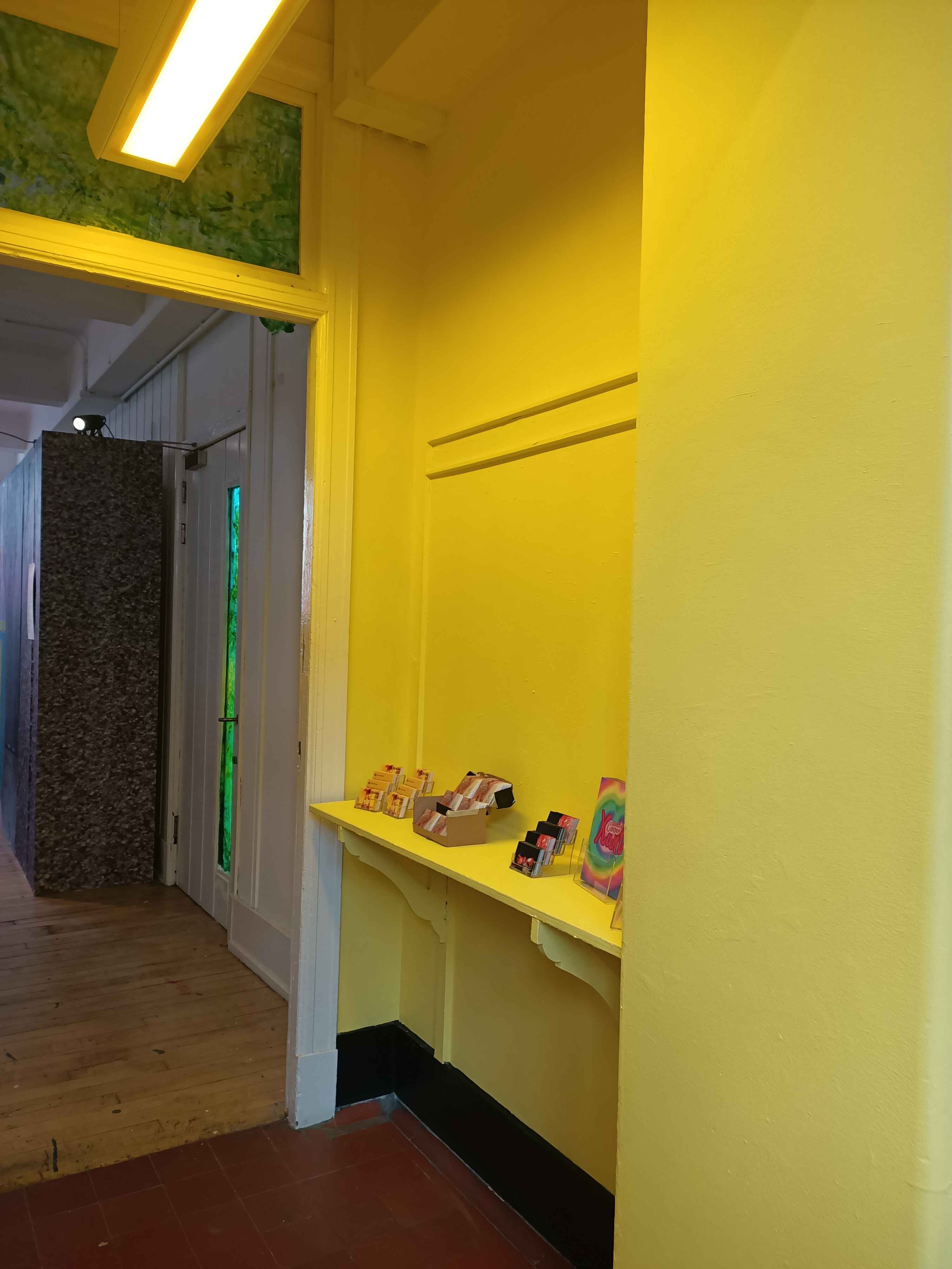 A yellow painted corridor in ECA.
