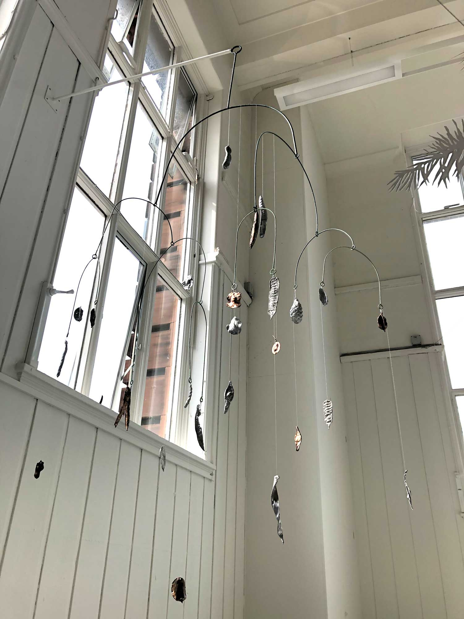 Mobile with seed pods made of bronze, aluminium and pewter