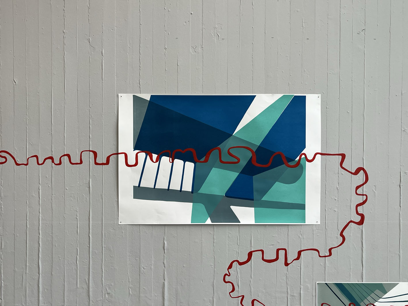Screen print with a painted red line running over the print and the wall.