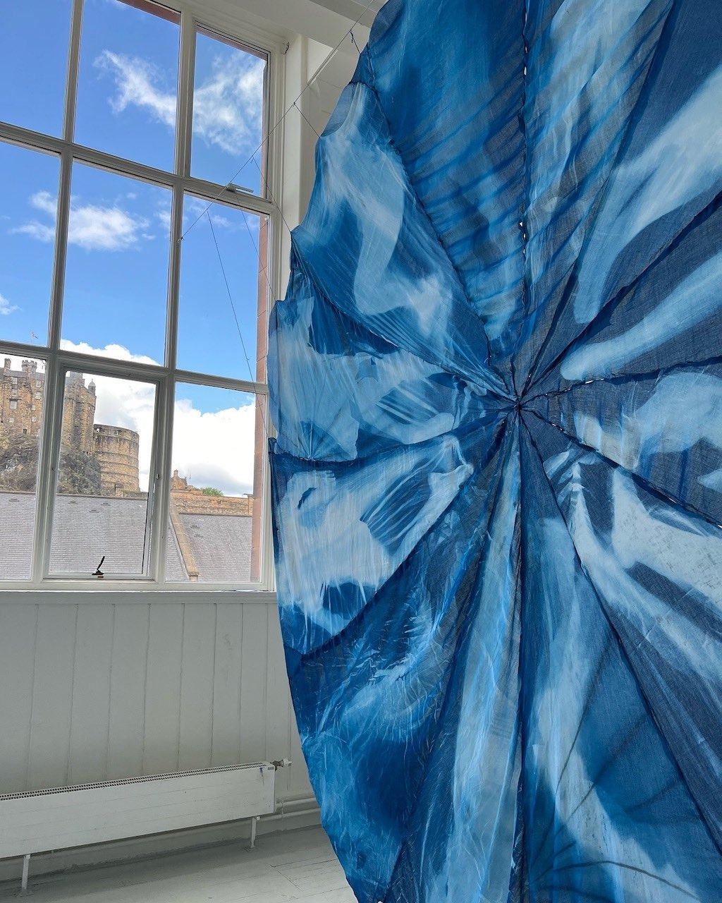 Blue floating circles with impressions of bodies