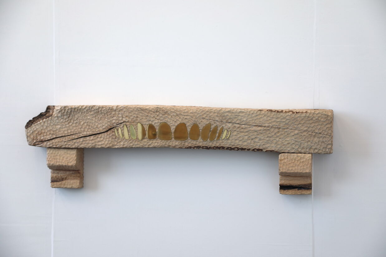 mantle Piece with brass teeth 