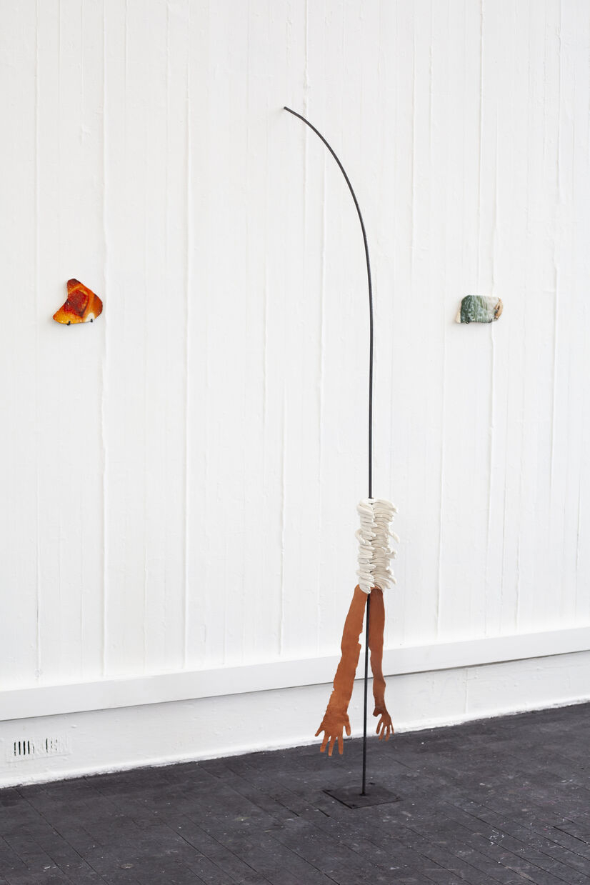 ceramic arms with ribs on a pole