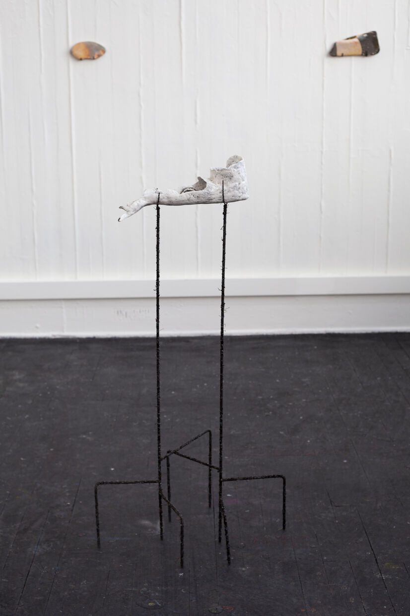 Ceramic arm on steel poles
