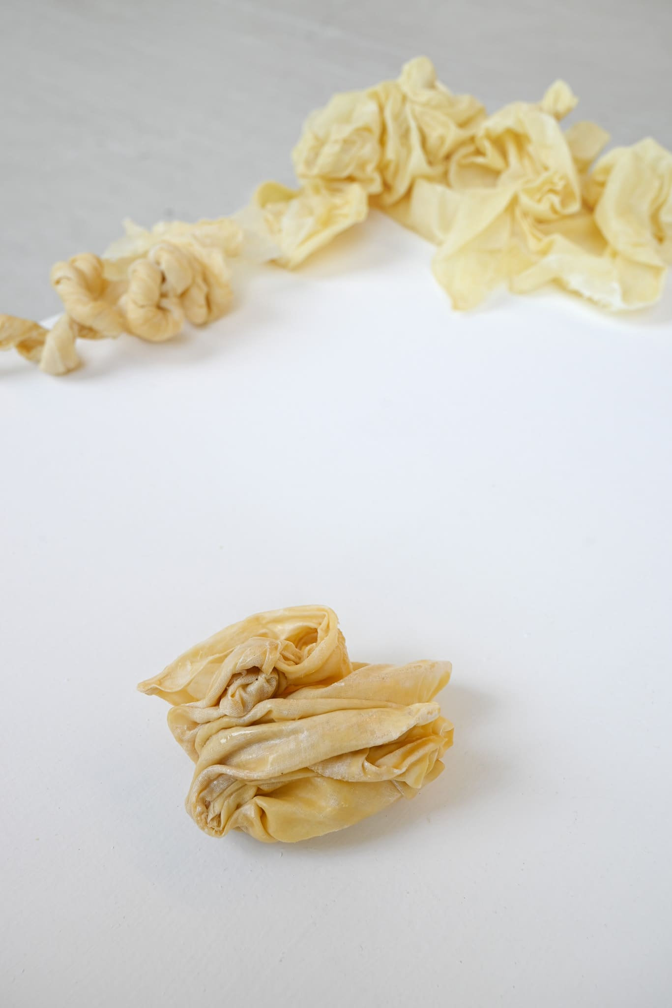 Tie down, wax and fabric, 2024