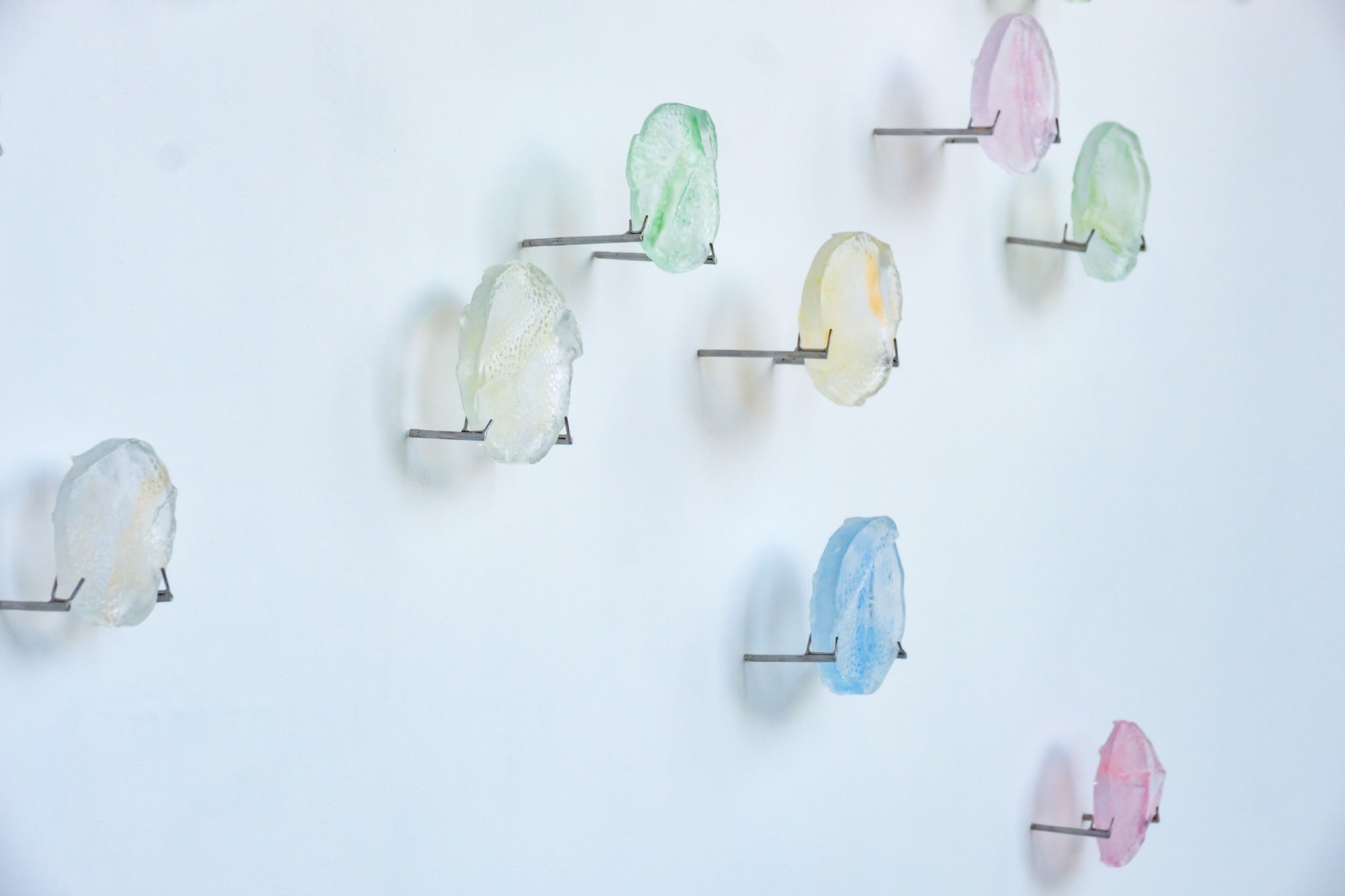 31 small glass pieces and 62 metal fixings. 