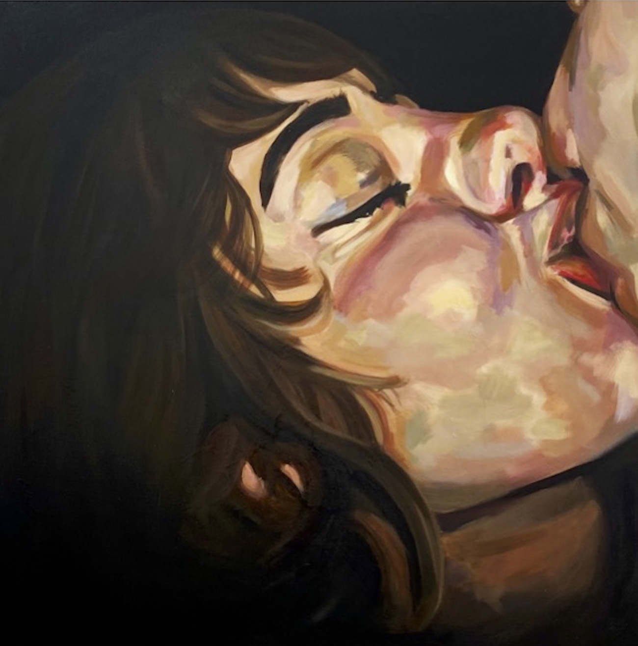 side profile of a woman in the act of a kiss. In the corner of the painting a hint of a mouth and nose of another person. Black background surrounds figure.